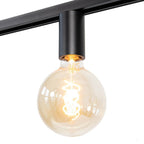Zwarte E27 railspot met glazen lampbol en open filament zichtbaar