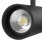 Zwarte railspot met LED-lens en reflector, zichtbare lichtopening