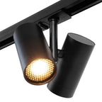 Zwarte spot op rail met GU10-ledgloed en uitwaaierende reflectorkap