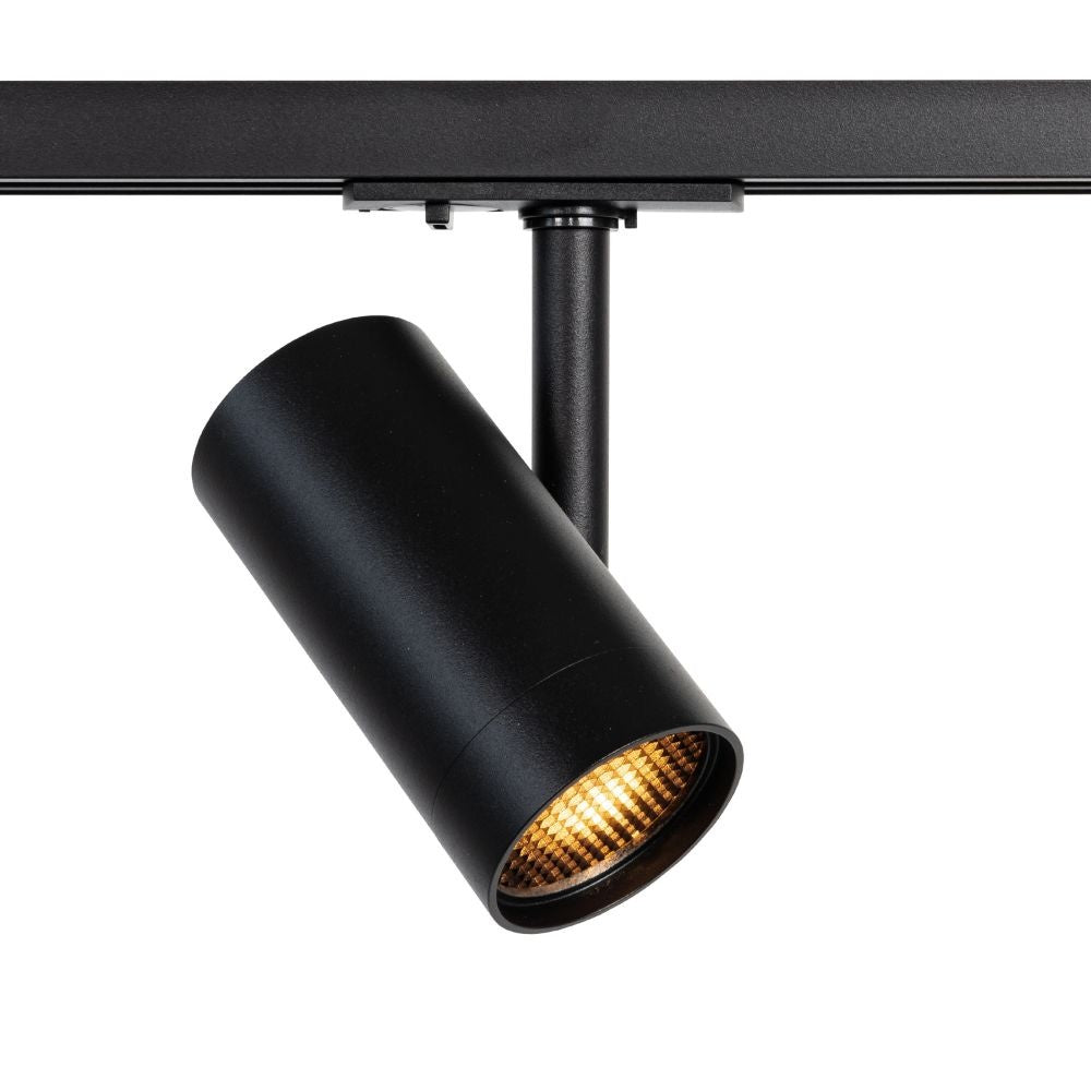 Zwarte rails pot met zichtbaar warm licht in de lens en cilindrische behuizing