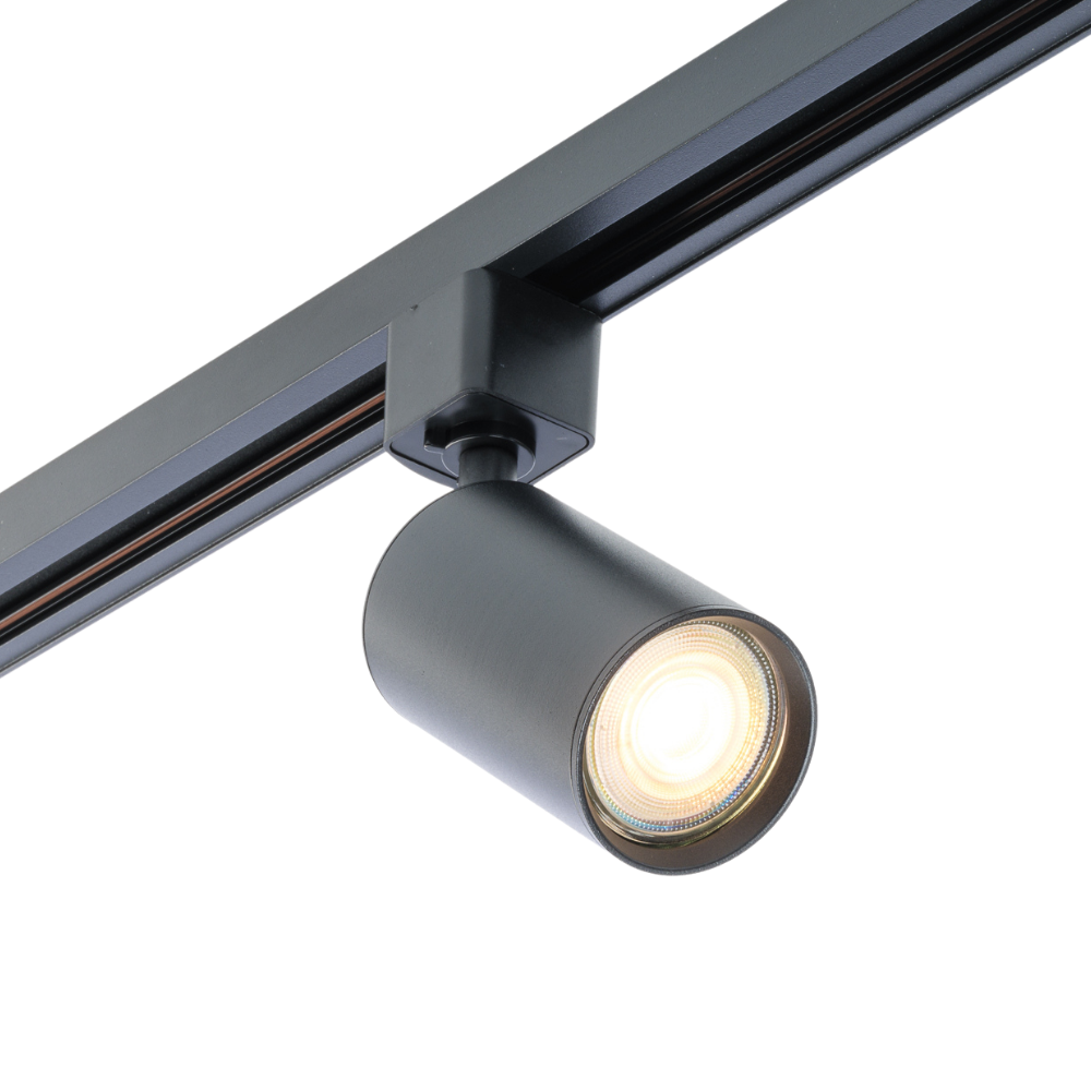 Zwarte GU10 spot op rail, cilindrische fitting met warm licht